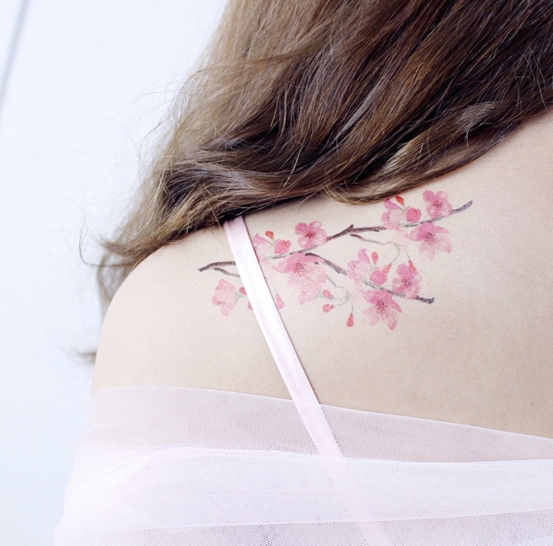 The Meaning Of Cherry Blossom Tattoos According To Different Cultures -  GirlTalkHQ