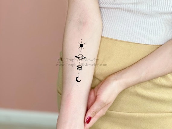 Minimalist cosmos tattoo - Tattoogrid.net