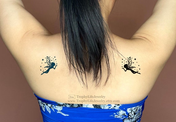 black fairy tattoo on thigh | Fairy tattoo, Faerie tattoo, Tattoos with  meaning