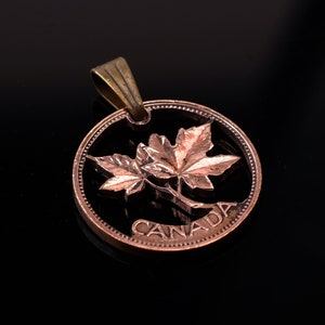 1965 Canada 1 cent A maple leaf twig Cut coin pendant with necklace Hand cut 19 mm. image 1