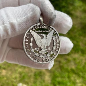 1 moneta "Morgan Dollar" in argento da 0,900 USA con taglio aquila, pendente e collana In God We trust, New York, Washington. immagine 4