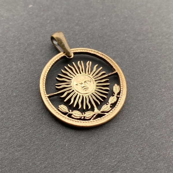 Argentina sun 1 peso cut coin pendant with necklace. Hand cut.
