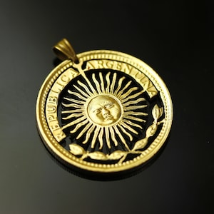Sun, Argentinas 10 pesos cut coin pendant with necklace. New design.