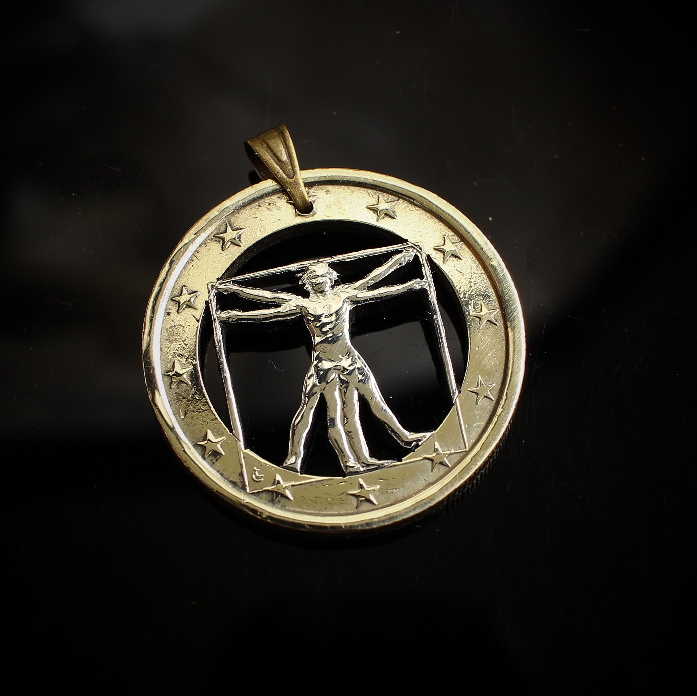 レオナルド・ダ・ヴィンチ作「ウィトルウィウス的人体図」カットコイン