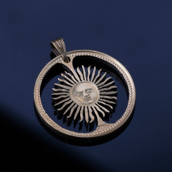 Argentina Peso Sun cut coin pendant with necklace. Buenos Aires