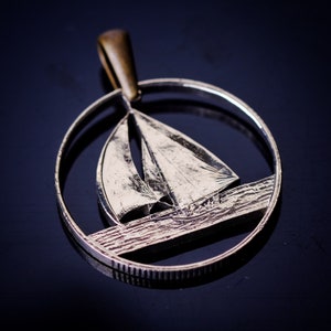 1988 Bermuda 1 dollar cut coin pendant sailing boat  caribbean beach Hamilton