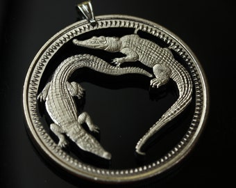 Papua New Guinea 1-KINA Saltwater Crocodile Cut Coin Pendant with Necklace. Hand Cut