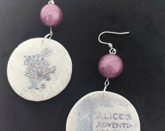 round alice and rabbit earrings, white and purple pearl, shiny finish, asymmetrical