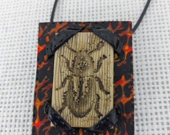 Square beetle pendant, black and red, material effect (ivory or old wood, fabric and leather), all light, unique creation