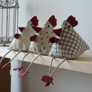 Trio of home decor chickens in country style