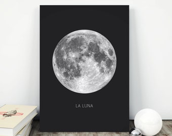 May include: A black and white print of a full moon with the text "LA LUNA" below it.