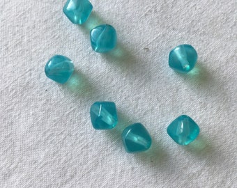 Set of turquoise vintage resin beads. Pearls spinning tops light blue turquoise shiny. Vintage resin top beads, for DIY jewelry.