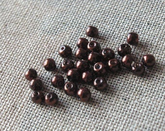 Lot de 10 perles de verre nacrées marron - 4mm