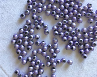 10 round purple metal beads. Round marbled beads in a set. Fine metal beads, iridescent effect. Lot of purple, purple colored beads.