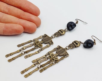 Long Skeleton Earrings (2 Styles - White or Black Skulls)