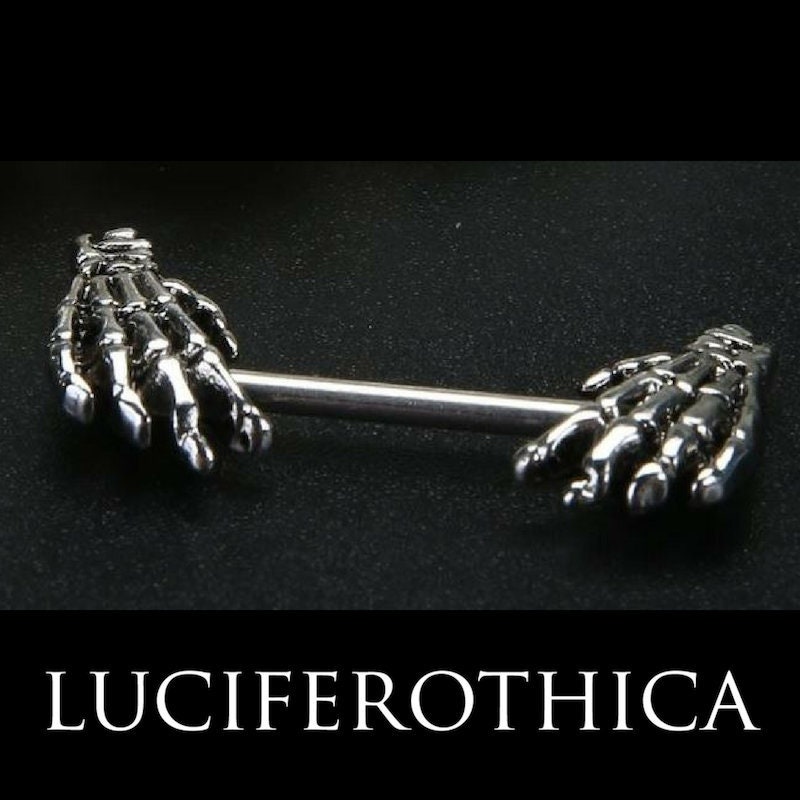 Skull hand shop nipple rings