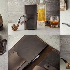 May include: A brown leather pipe and tobacco pouch with a wooden pipe and a brown leather strap. The pouch has multiple pockets and compartments for storing tobacco, a pipe, and other accessories.