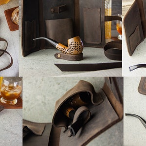 May include: A brown leather pipe carrying case with multiple pockets and a strap. The case is open to reveal a wooden pipe and a small pouch.