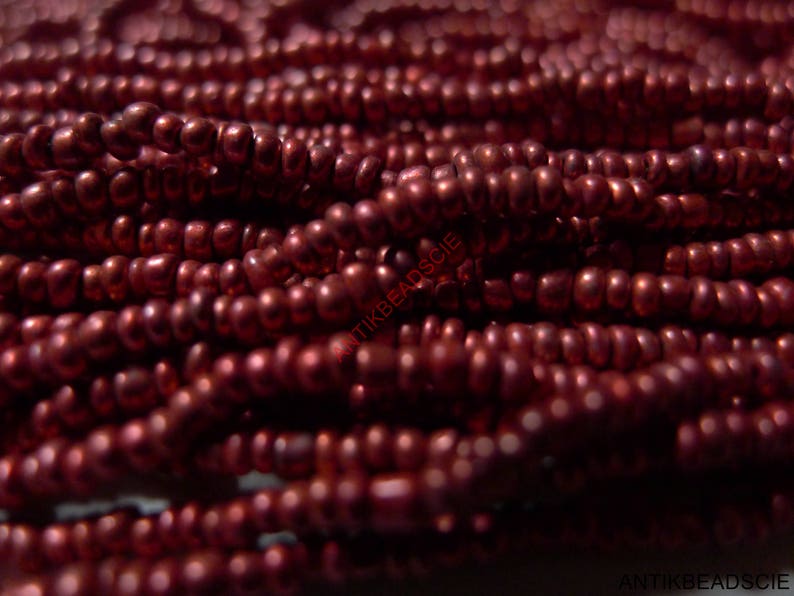 1 hank antique glass beads 100