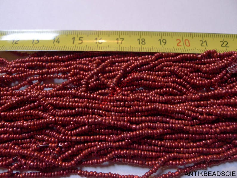 1 hank antique glass beads 100