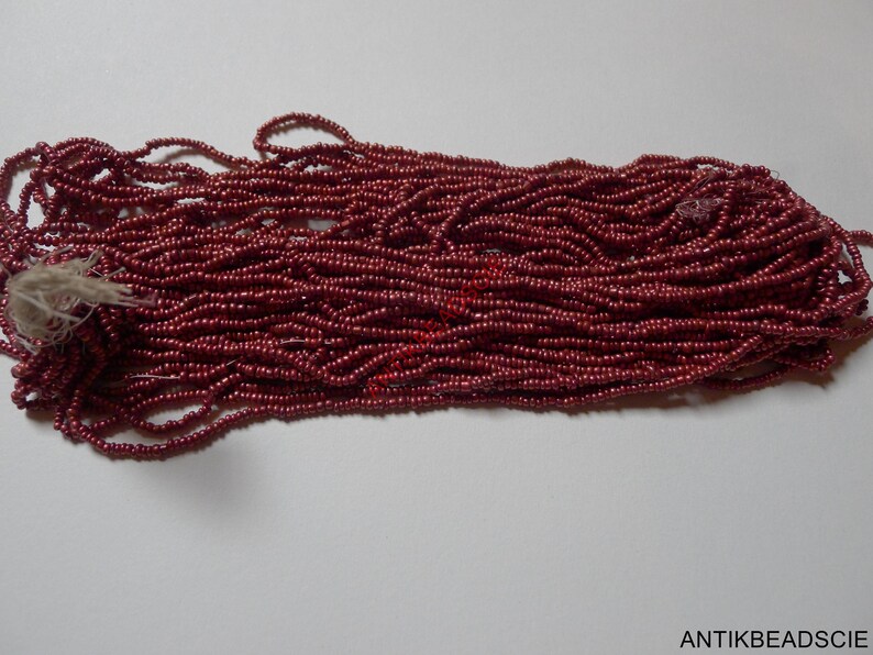 1 hank antique glass beads 100