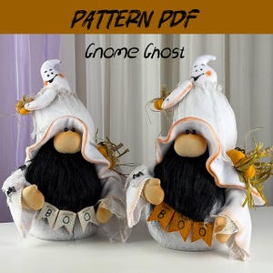 May include: Two handmade Halloween gnome ghosts. Each has a white body, a black beard, and a smiling ghost head. They hold small pumpkins and have a banner that says "BOO". The text "PATTERN PDF Gnome Ghost" is at the top.