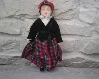 Small collectible porcelain Scottish doll