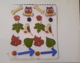 Brads depicting forest animals