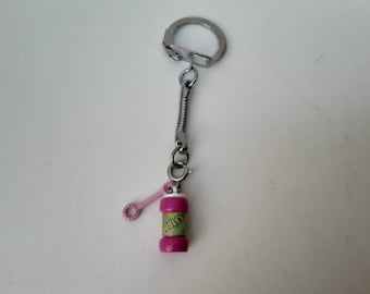 Key ring representing a device to make bubbles