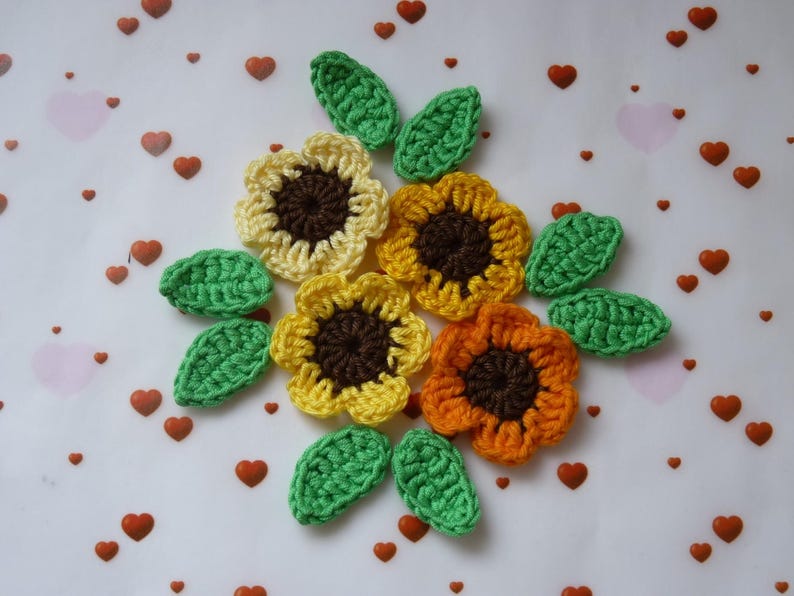 4 yellow and orange flowers and 8 crochet leaves, crochet tounes 4 yellow and orange flowers and 8 crochet leaves, crochet tounes