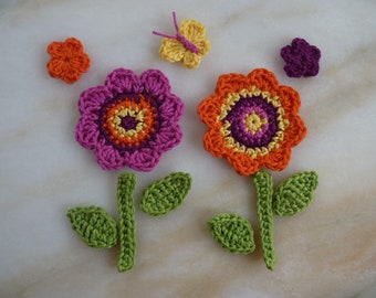 my handmade crochet flower garden 2 large flowers, 2 small flowers, 1 butterfly, stems and leaves (11 pieces)