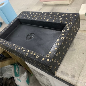 Black & gold concrete sink