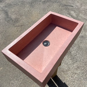 Pink Concrete sink