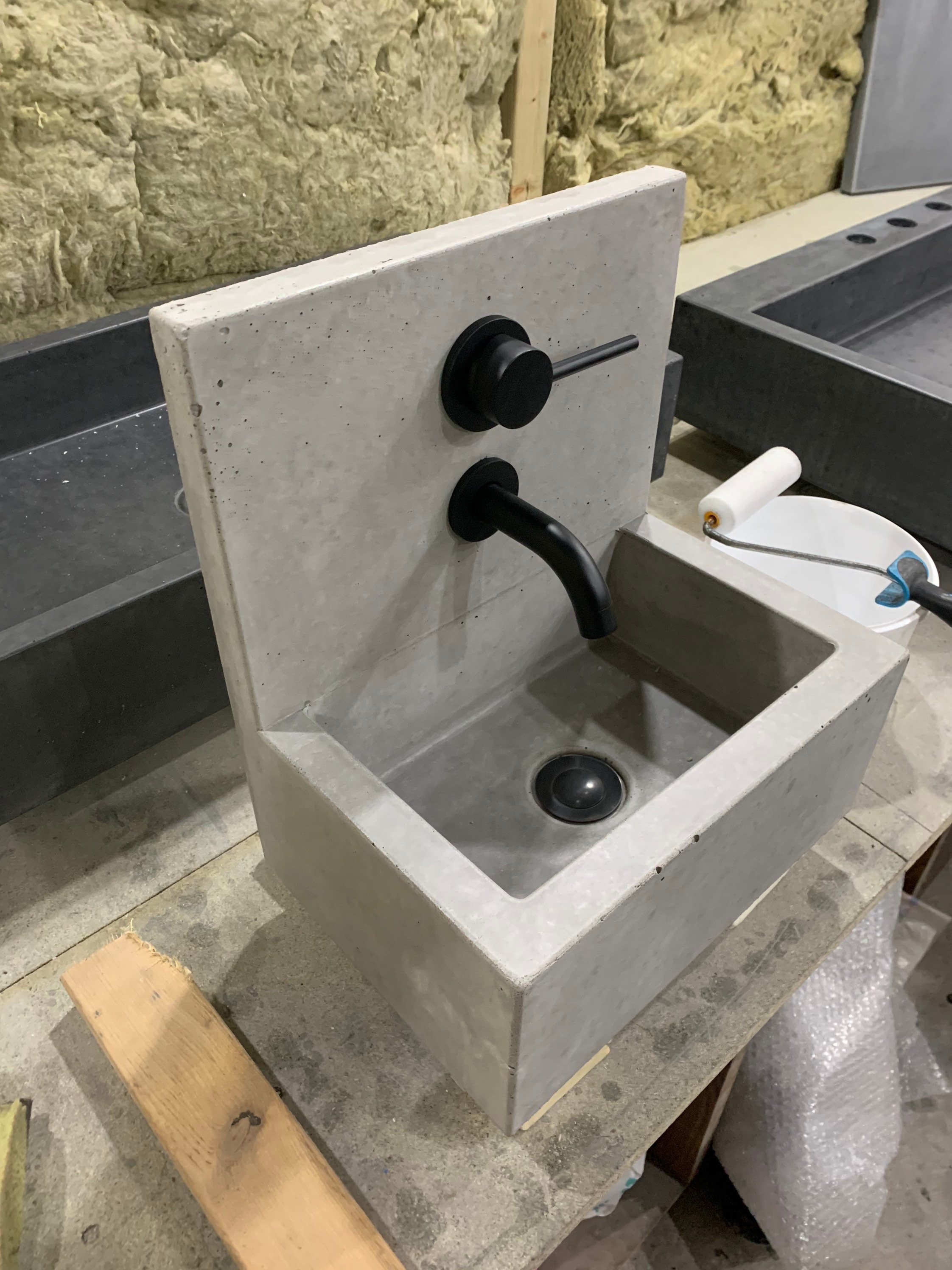 Concrete sink with cast splash back