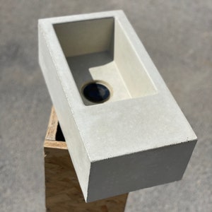 Mini concrete bathroom sink