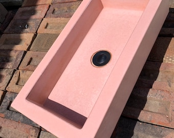 Pink concrete trough sink