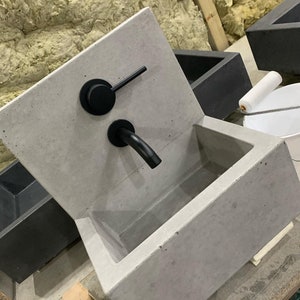 Concrete sink with cast  splash back
