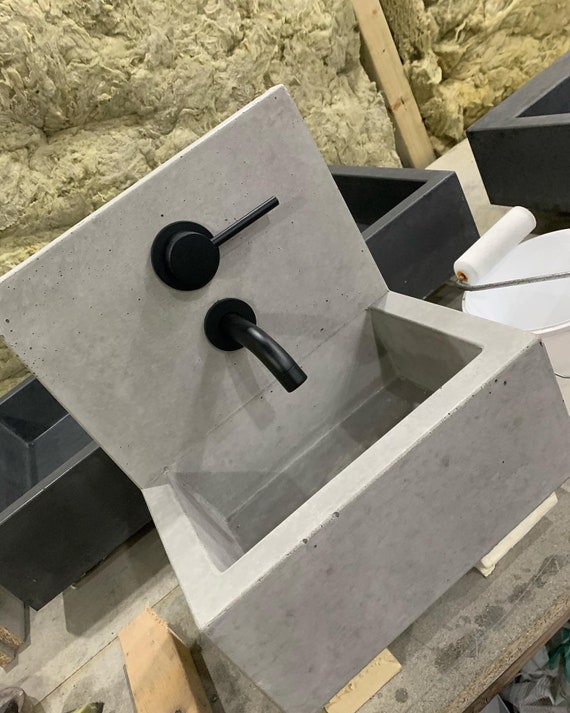 Concrete sink with cast  splash back