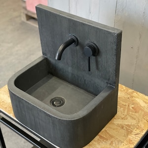 Concrete sink with cast  splash back