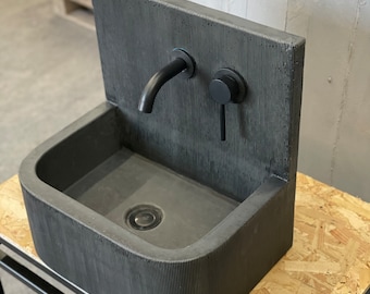 Concrete sink with cast  splash back