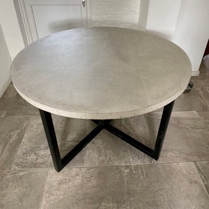 Round concrete dining table