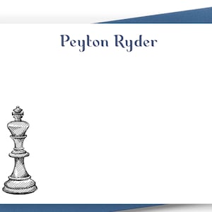 May include: White stationery card with a blue envelope. The card has a black and white illustration of a chess king and the text "Peyton Ryder" in blue.