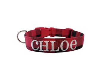 May include: Red and black plaid dog collar with a silver D-ring and the name "CHLOE" embroidered in white.