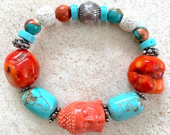 Exotic Boho Chic stretch elastic bracelet w/turquoise, red bamboo coral, jade, lava stone, magnesite, & a coral resin Buddha head focal bead
