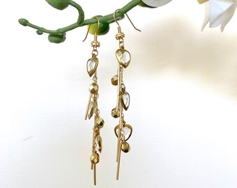 Boho Glam, dramatic dressy light weight matte gold metal stick dangle drop pierced earrings/gold & crystal heart charms, faceted gold beads