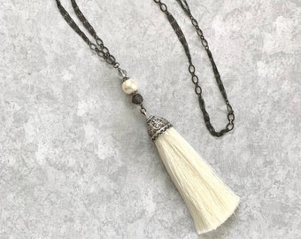 Long tassel necklace-etched metal cap ivory silk tassel, Czech & blown glass beads, Swarovski pearl on multi strand matte gunmetal chain