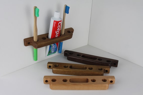  Organizador de cepillos de dientes para baño, almacenamiento de  pasta de dientes, soporte para maquinilla de afeitar, colgador, juego de  mostrador de tocador : Hogar y Cocina