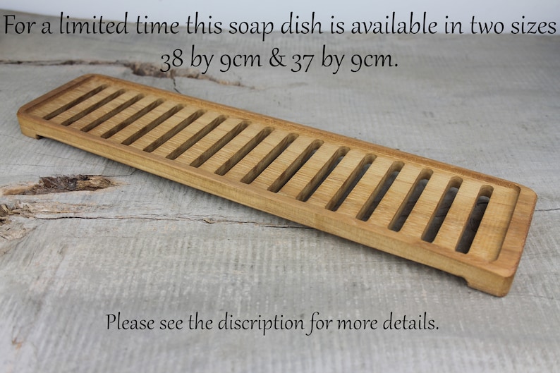 May include: A wooden soap dish with a slatted design. The dish is available in two sizes: 38 by 9 cm and 37 by 9 cm.