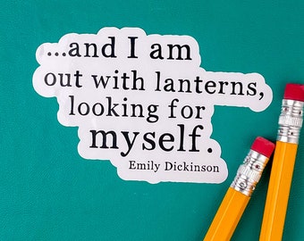 May include: A white sticker with a quote by Emily Dickinson: "...and I am out with lanterns, looking for myself." The sticker is on a teal background with two yellow pencils.