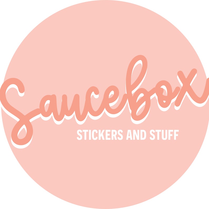 May include: A pink circle with the text "Saucebox" in white outlined pink lettering. Below the text is the phrase "Stickers and Stuff" in white lettering.
